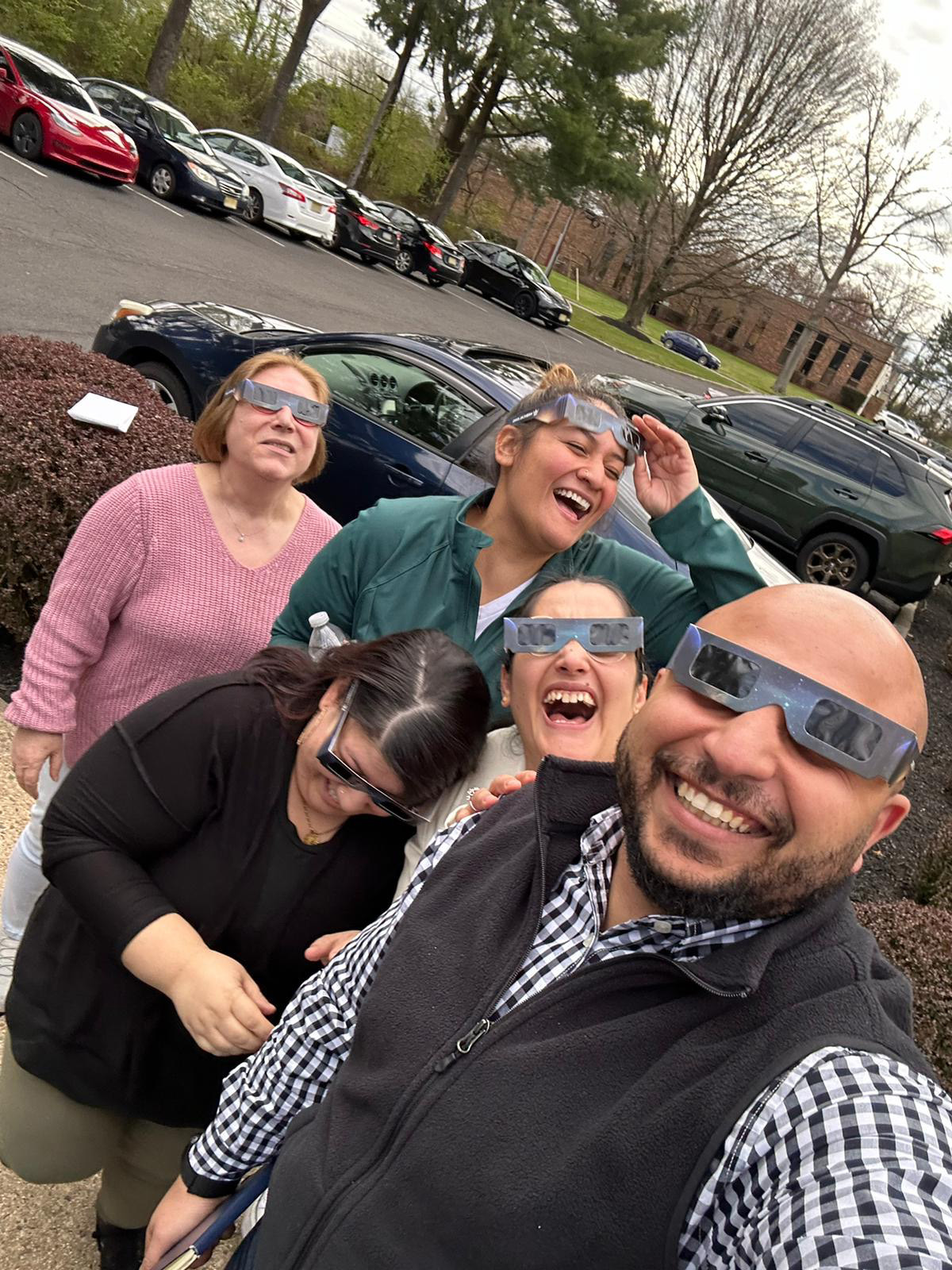 Rees Accounting Team watching the solar eclipse