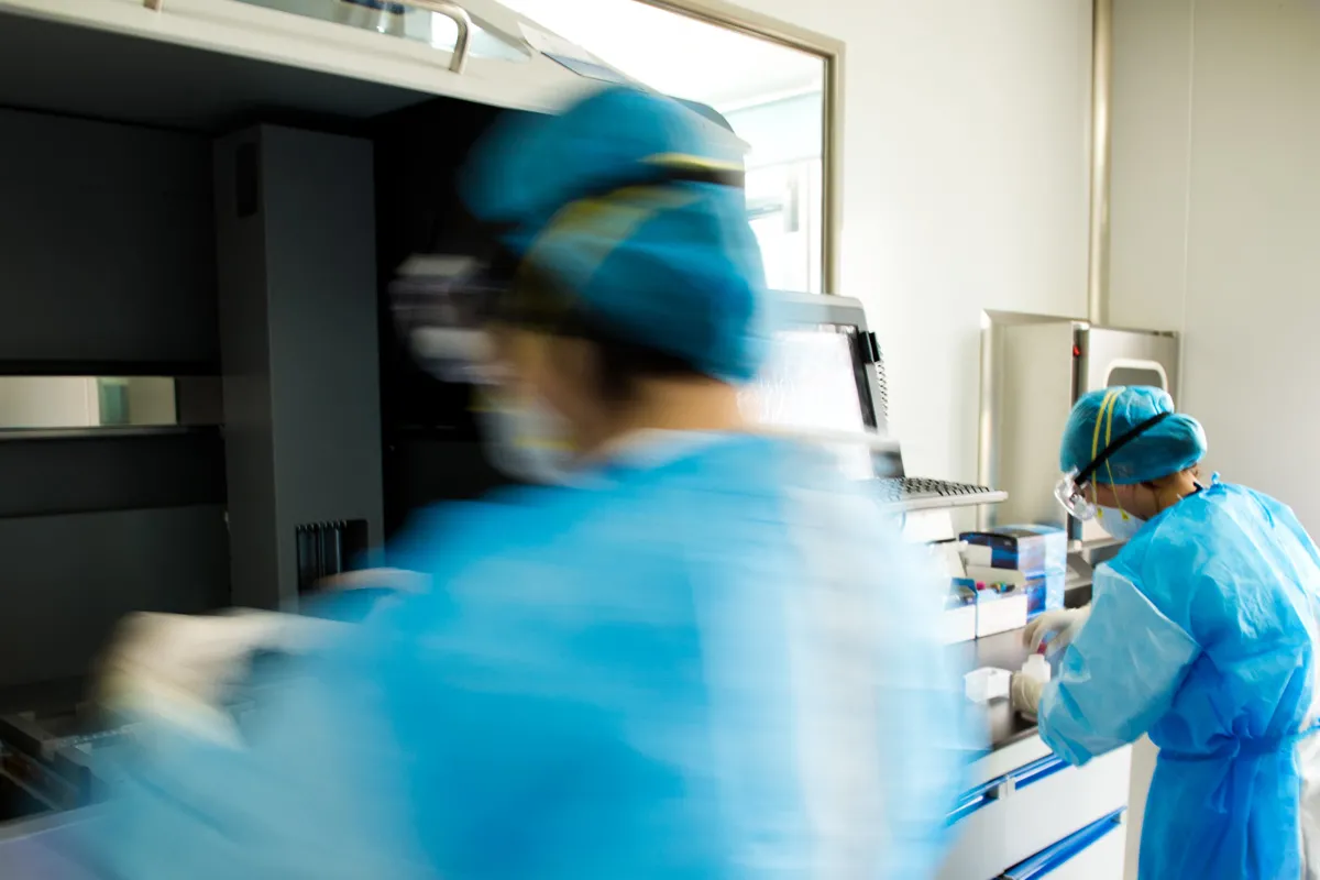 two busy colleagues in cleanroom