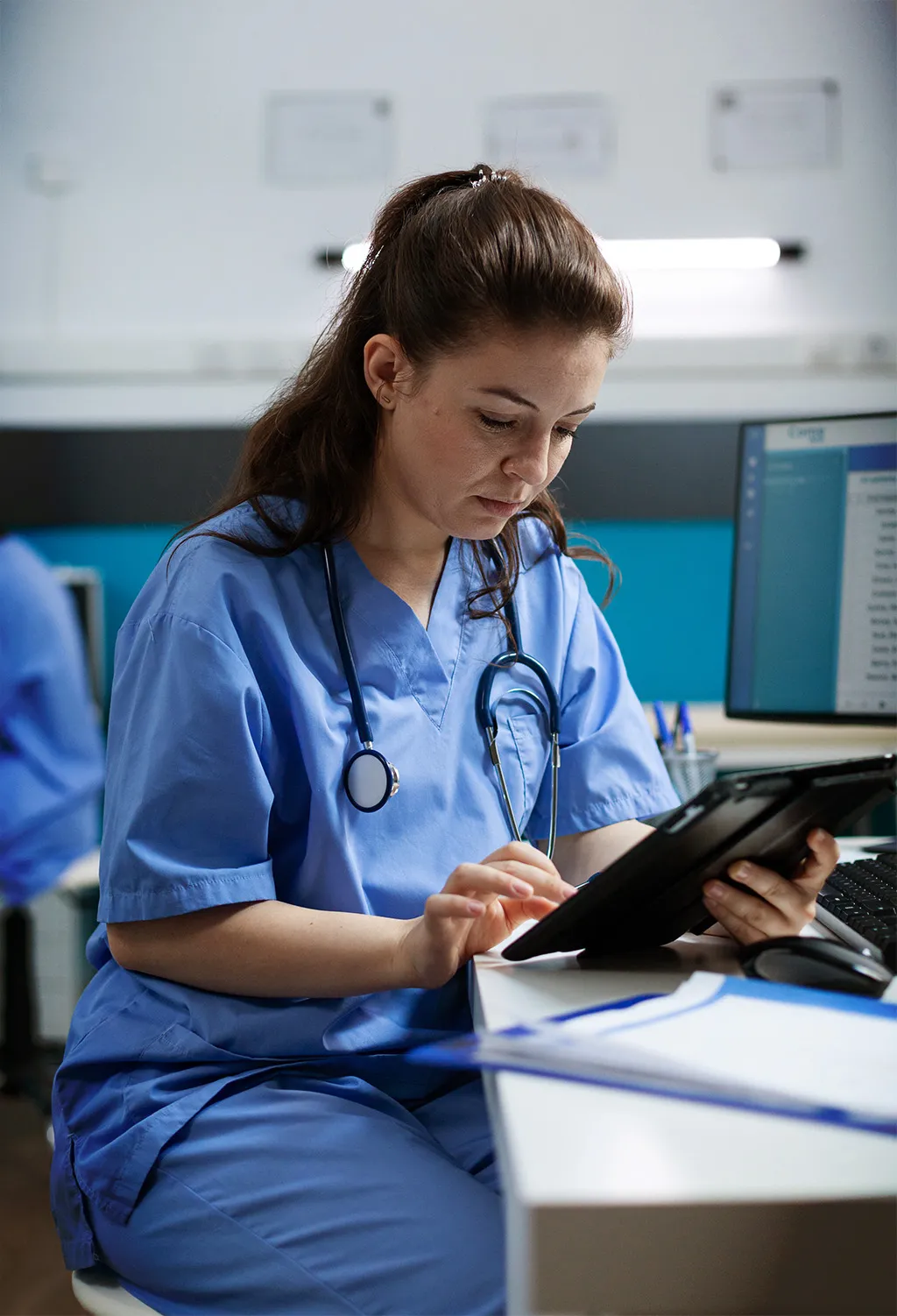 nurse at desk