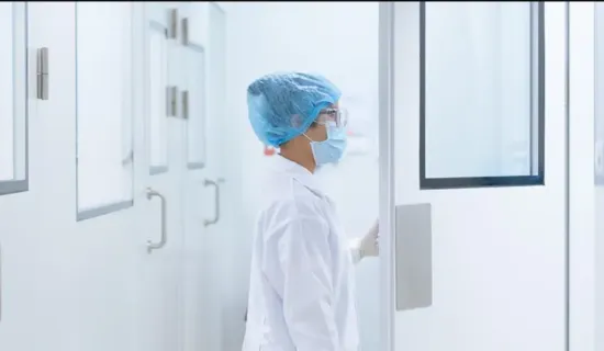 scientist entering cleanroom